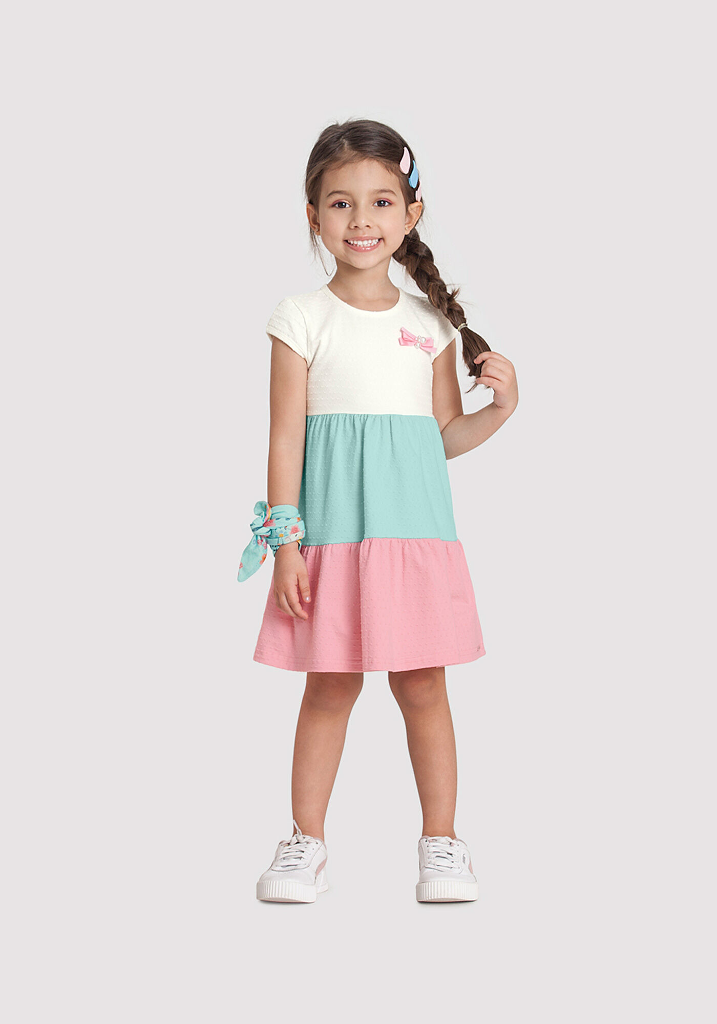 Vestido Infantil em Malha Texturizada com Babados